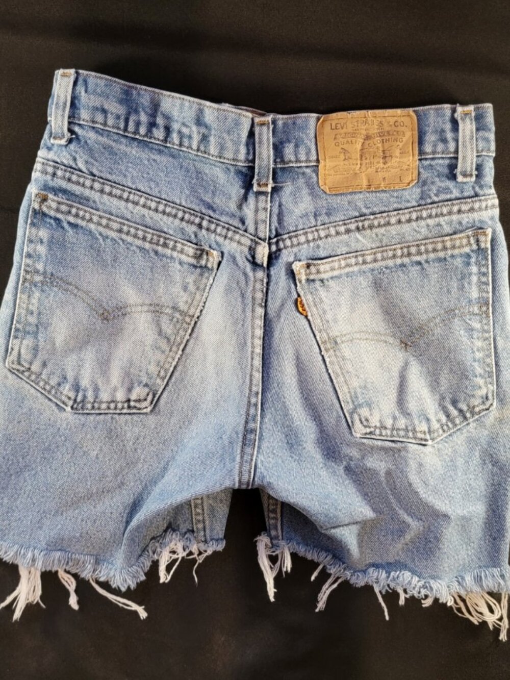 Levi’s Distressed Cutoff Denim Shorts Orange Tab Light Wash Frayed Raw Hem 31W